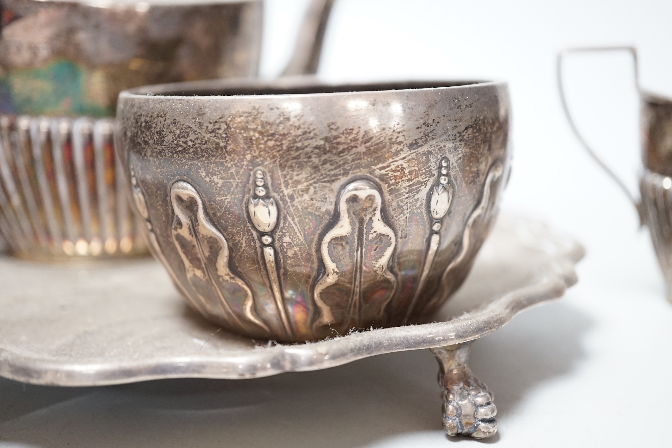 A late Victorian silver sugar bowl, William & John Barnard, London, 1891, a silver three piece bachelor’s tea set and a silver waiter, 27.9oz.